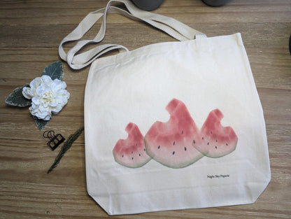 A beige cotton canvas tote bag with custom watercolor watermelon design