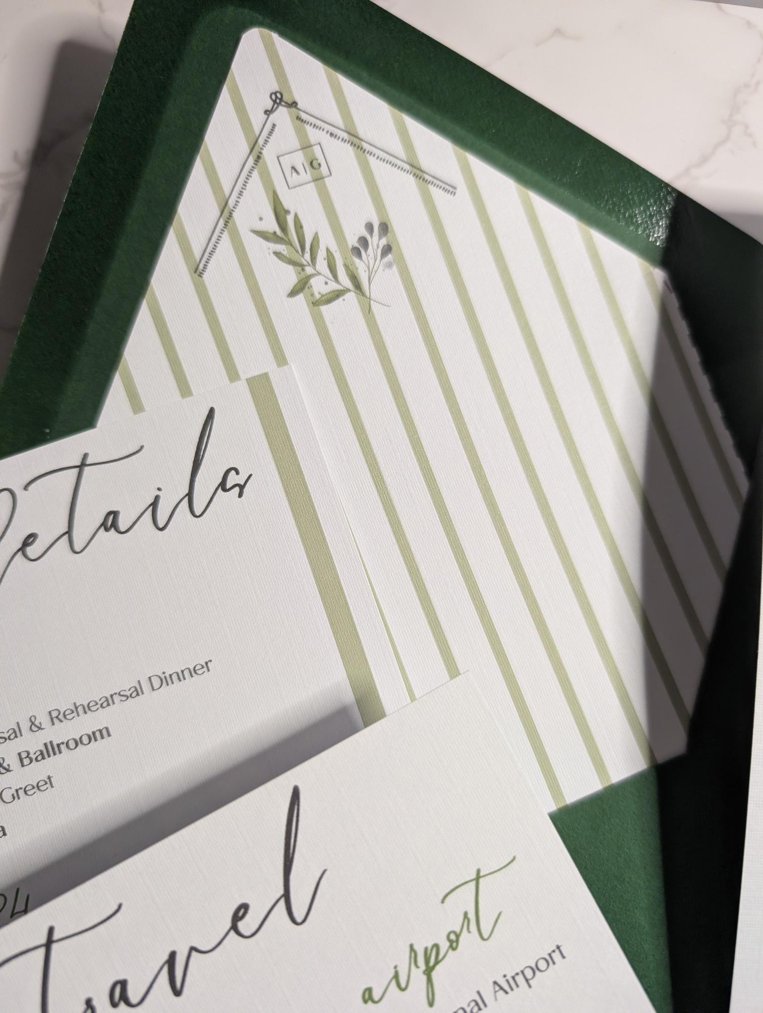 Green and white stationery items with text and design elements.