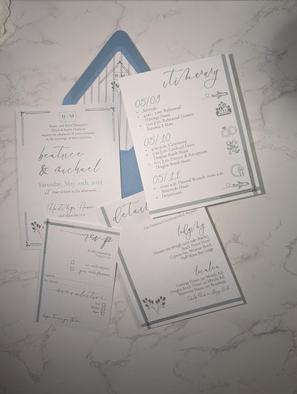 Set of wedding invitations on a marble surface