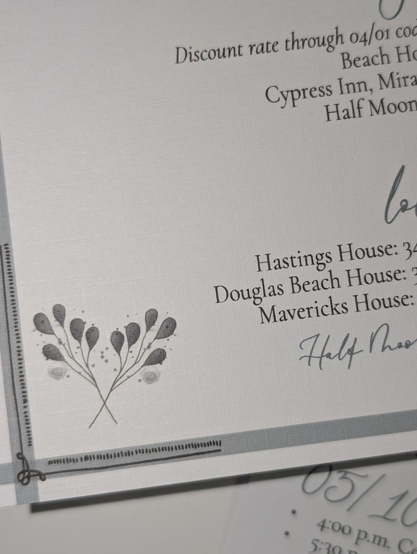 Close-up of a printed document with text and a decorative leaf design on a white background.
