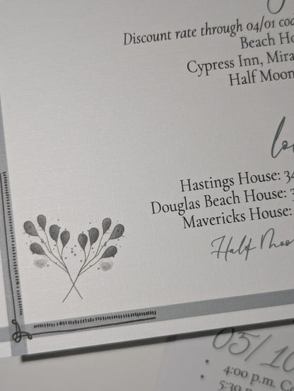 Close-up of a printed document with text and a decorative leaf design on a white background.