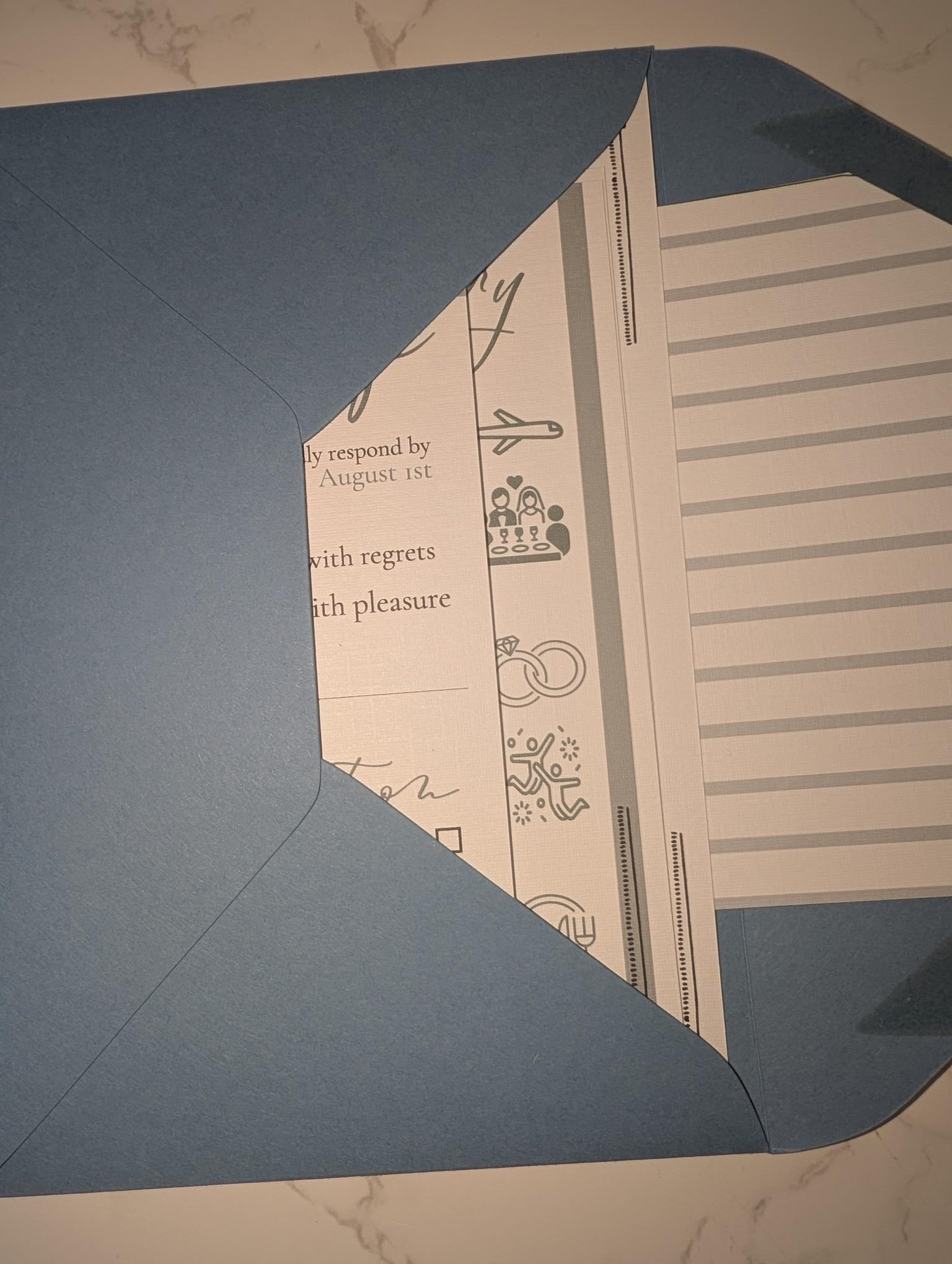 Decorative card with text and graphics on a blue envelope