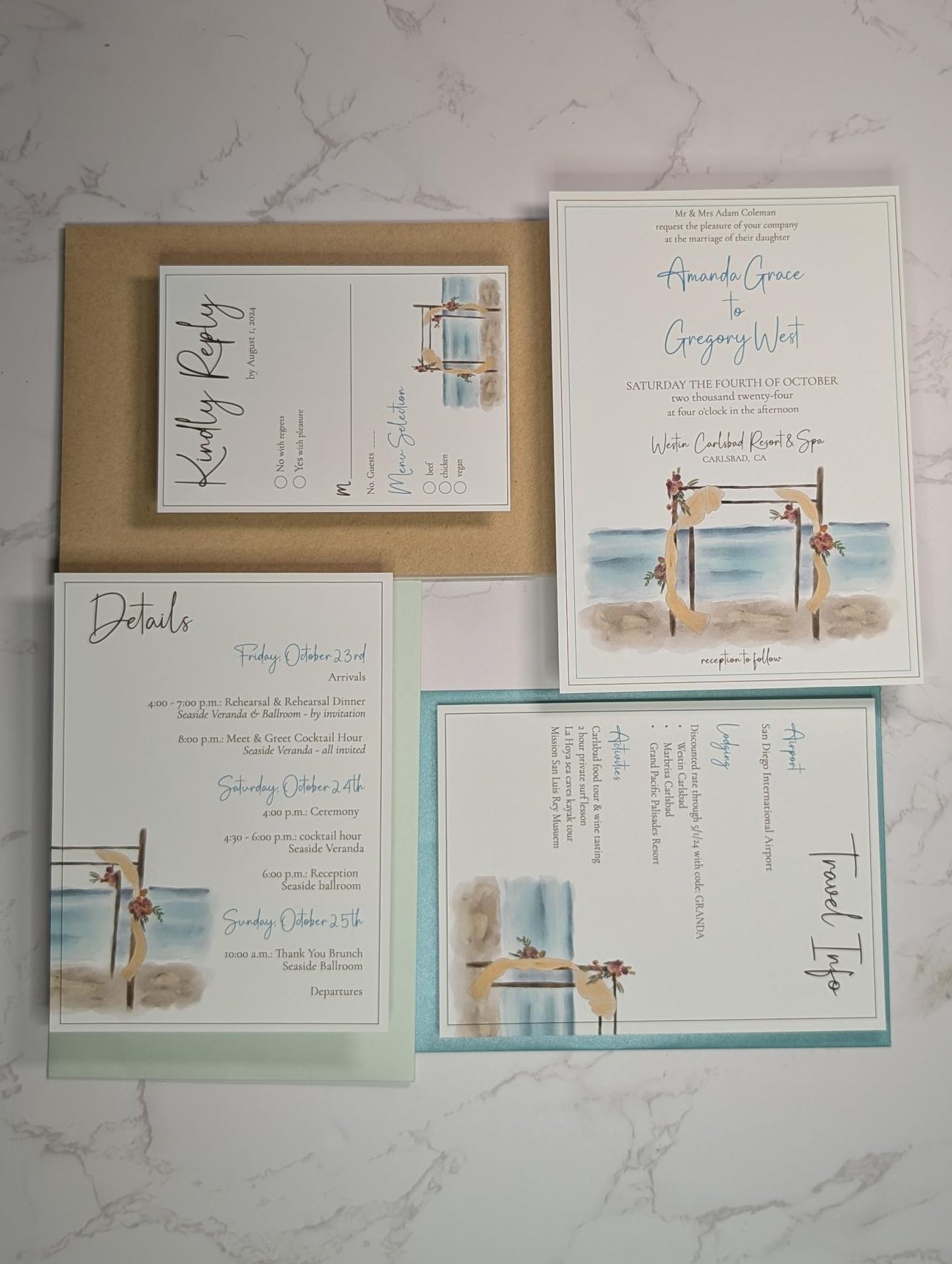 Set of wedding invitations on a marble surface