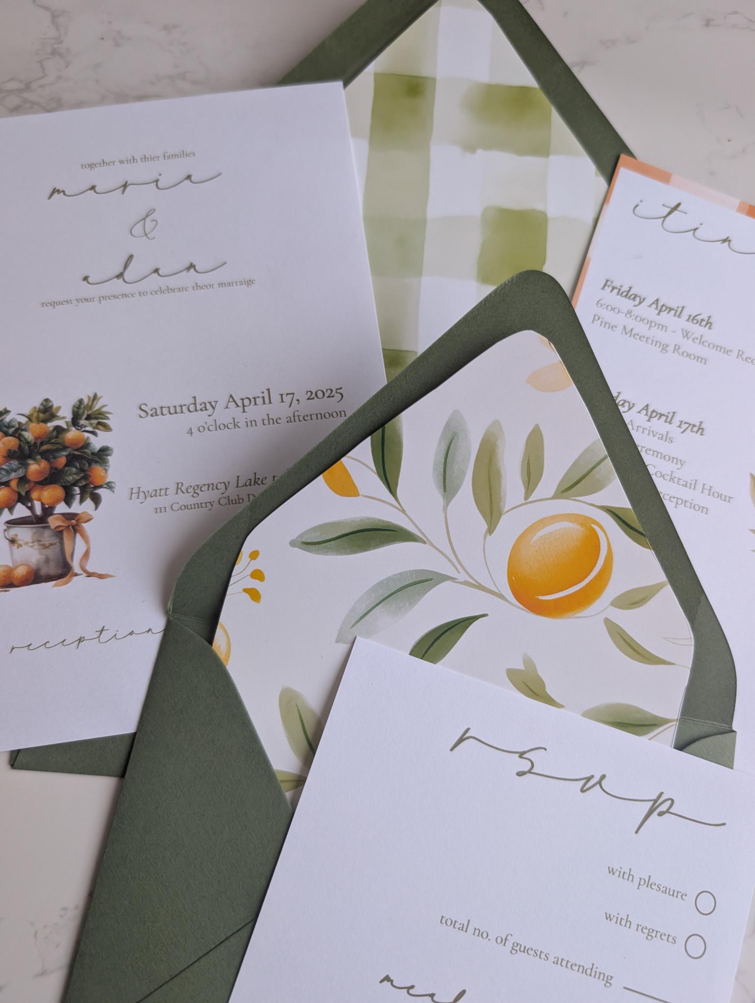 Wedding invitation set with green envelopes and floral design