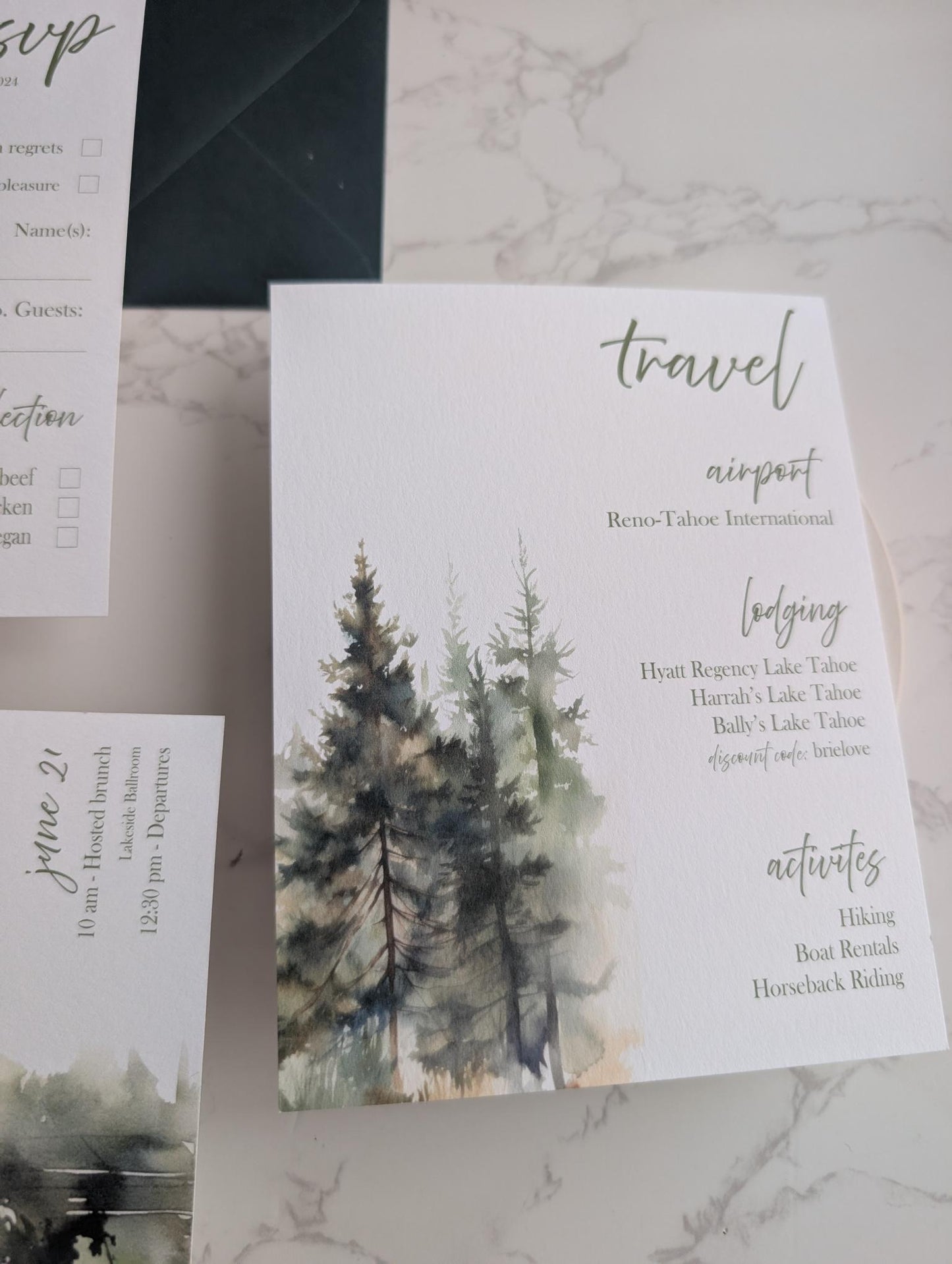 Invitation card with tree design on a marble surface