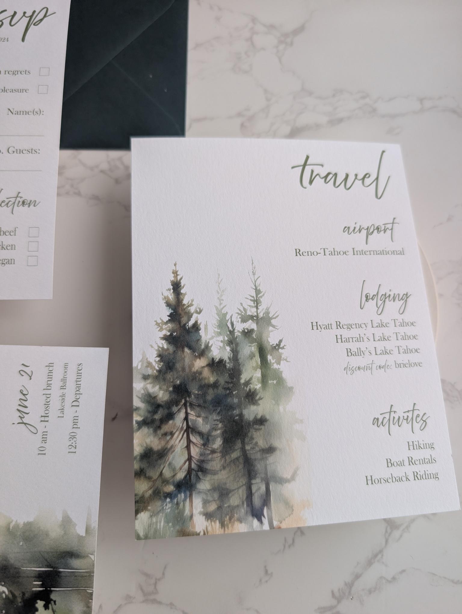 Invitation card with tree design on a marble surface