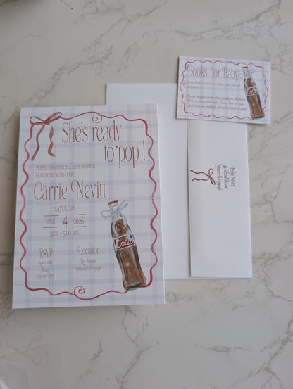 A flat-lay of a personalized birthday invitation suite featuring a main invitation card, an RSVP card, and an envelope on a light gray marble background. The design has a white and light gray plaid pattern with a red wavy border, brown ribbon graphic, and an illustration of a vintage Coca-Cola bottle.