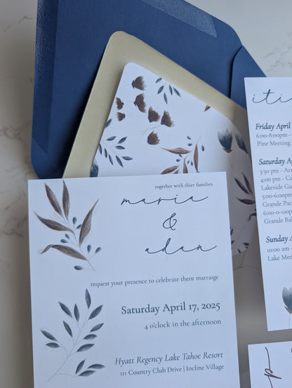Wedding invitation with blue envelope and floral design