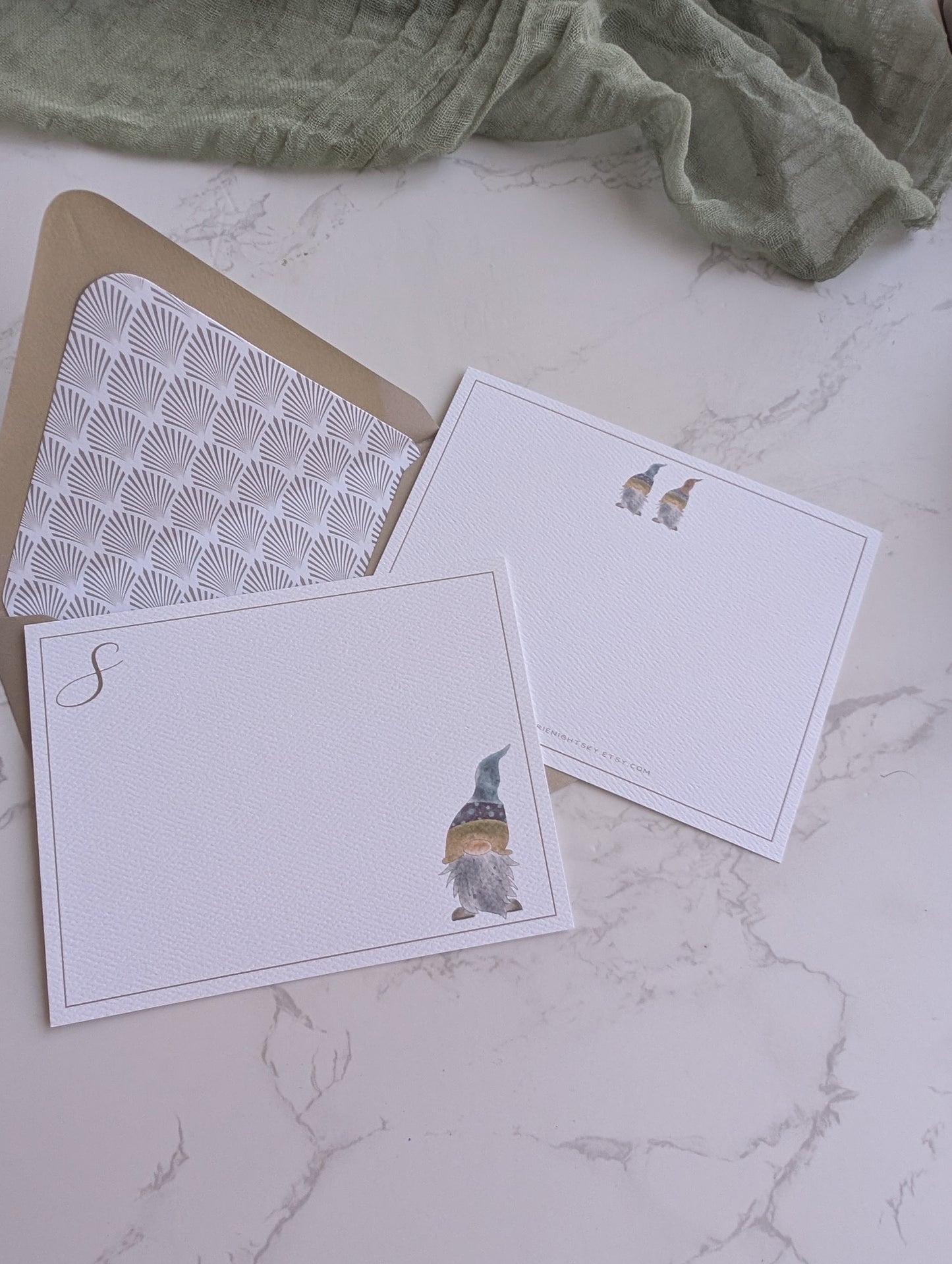 Set of greeting cards with illustrations on a marble surface